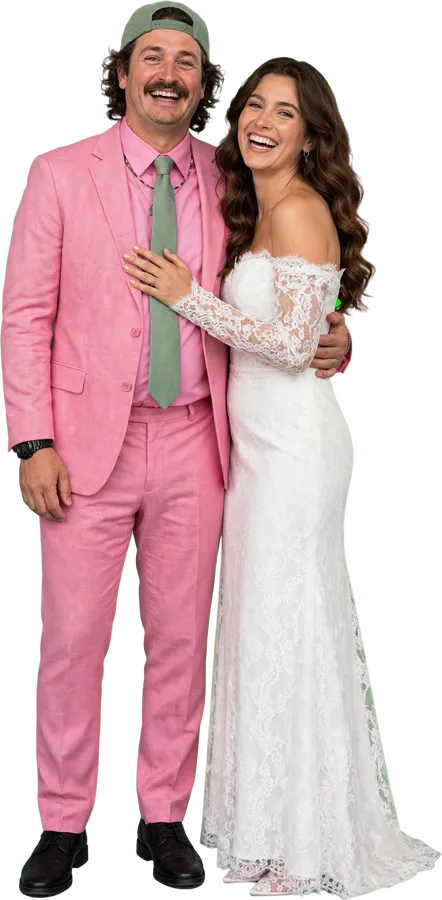 A bridal couple, he in a pink suit, she in a white dress
